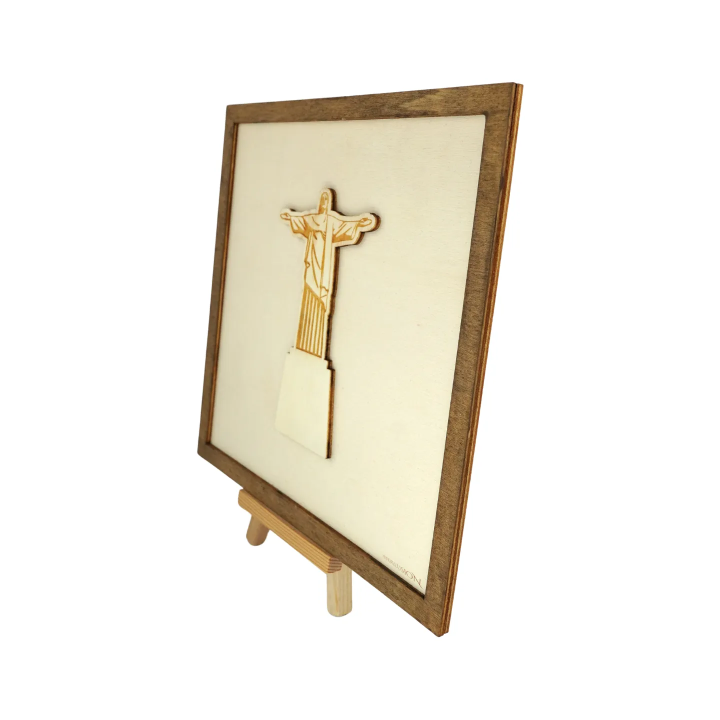 Customizable wall art frame of Christ the Redeemer in cut and engraved wood side view with easel Woodillusion