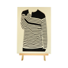 Customizable wall art frame of a silhouette in cut and engraved wood front view with easel Woodillusion