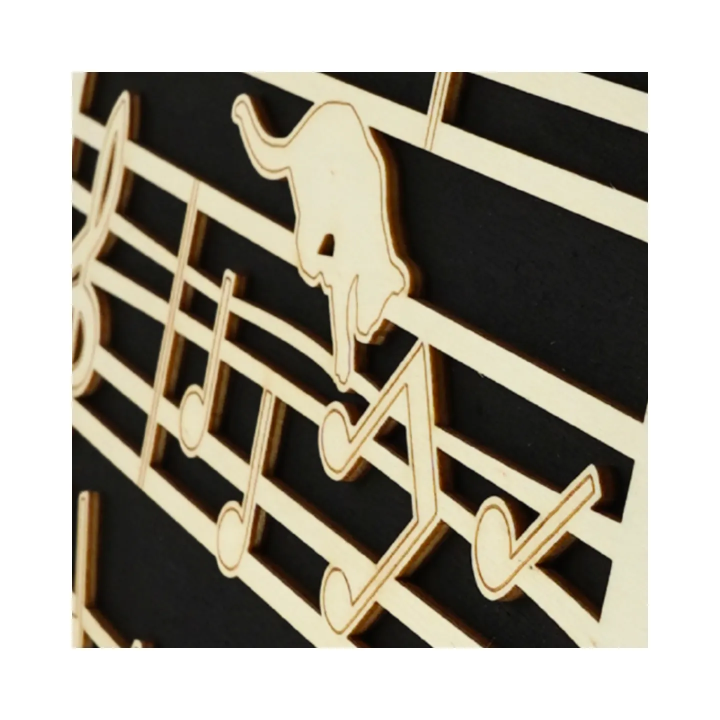 Zoom on customizable wall art frame of a cat in cut and engraved wood side view with easel Woodillusion