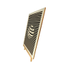 Customizable wall art frame of a sphere in cut and engraved wood side view with easel Woodillusion