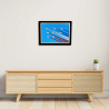 Entrance view with a customizable wall art frame of aerial aerobatics in cut and engraved
