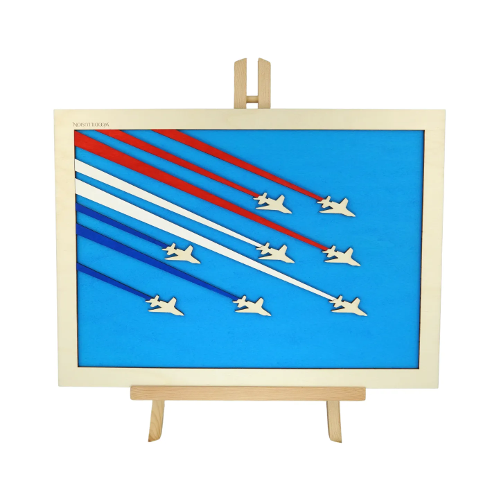 Customizable wall art frame of aerial aerobatics in cut and engraved wood front view with easel Woodillusion