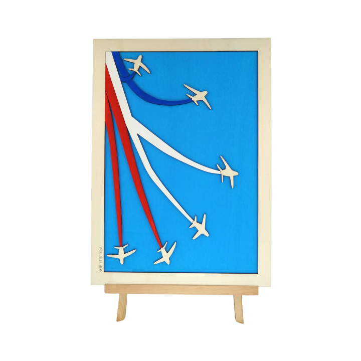 Customizable wall art frame of aerial aerobatics in cut and engraved wood