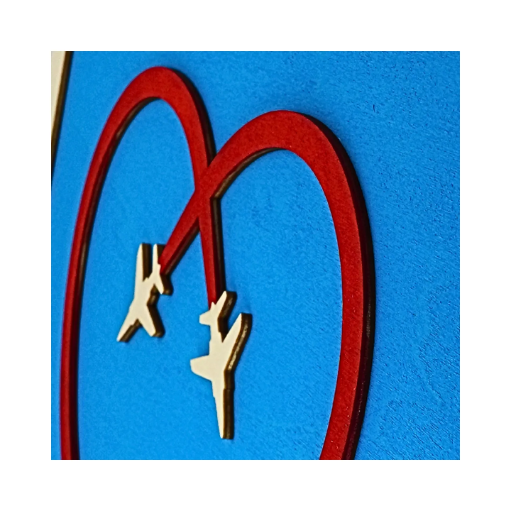 Zoom on a customizable wall art frame of aerial aerobatics in cut and engraved wood side view Woodillusion