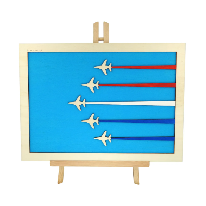 Customizable wall art frame of aerial aerobatics in cut and engraved wood front view with easel Woodillusion