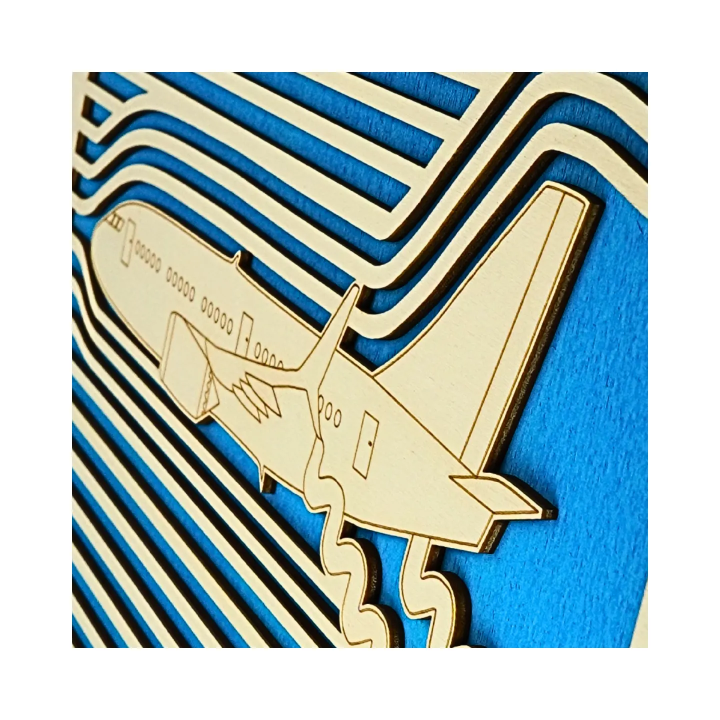 Zoom on a customizable wall art frame of an aeronautical design in cut and engraved wood side view with easel Woodillusion