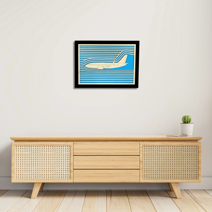 Entrance view with a customizable wall art frame of an aeronautical design in cut and engraved wood Woodillusion