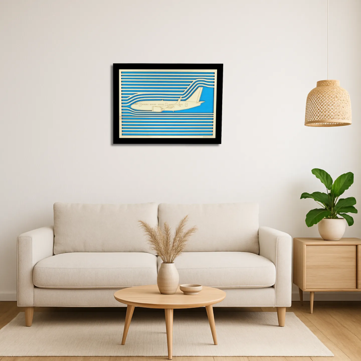 Living room view with a customizable wall art frame of an aeronautical design in cut and engraved wood