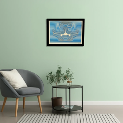 Vue d’une salle d’attente avec un tableau cadre personnalisable aéronautique en bois découpé et gravé