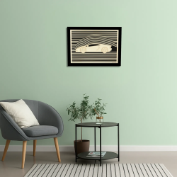 Vue d’une salle d’attente avec un tableau cadre personnalisable automobile en bois découpé et gravé