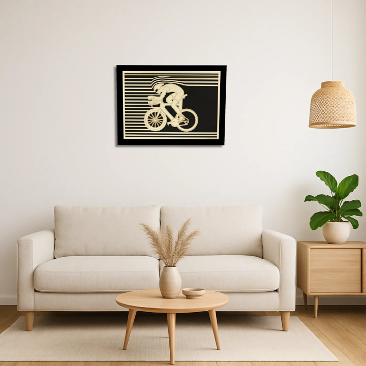 Living room view with a customizable wall art frame of a cycling design in cut and engraved wood