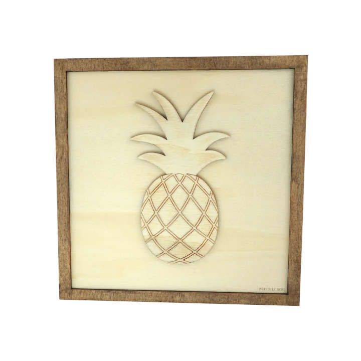Tableau cadre personnalisable d’un ananas en bois découpé et gravé vue de face Woodillusion
