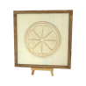 Customizable wall art frame of a lemon in cut and engraved wood front view with easel Woodillusion