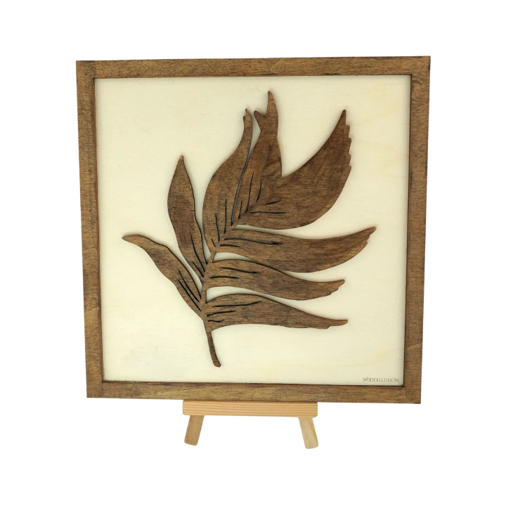 Tableau cadre personnalisable d’une feuille en bois découpé et gravé vue de face avec chevalet Woodillusion