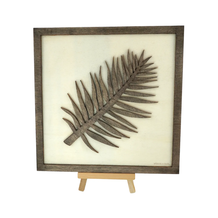 Tableau cadre personnalisable d’une feuille en bois découpé et gravé vue de face avec chevalet Woodillusion