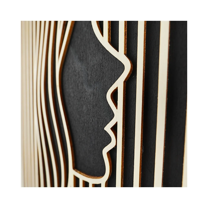 Zoom on customizable wall art frame of a face in cut and engraved wood side view with easel Woodillusion
