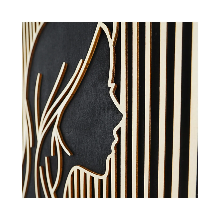 Zoom on customizable wall art frame of a face in cut and engraved wood side view Woodillusion